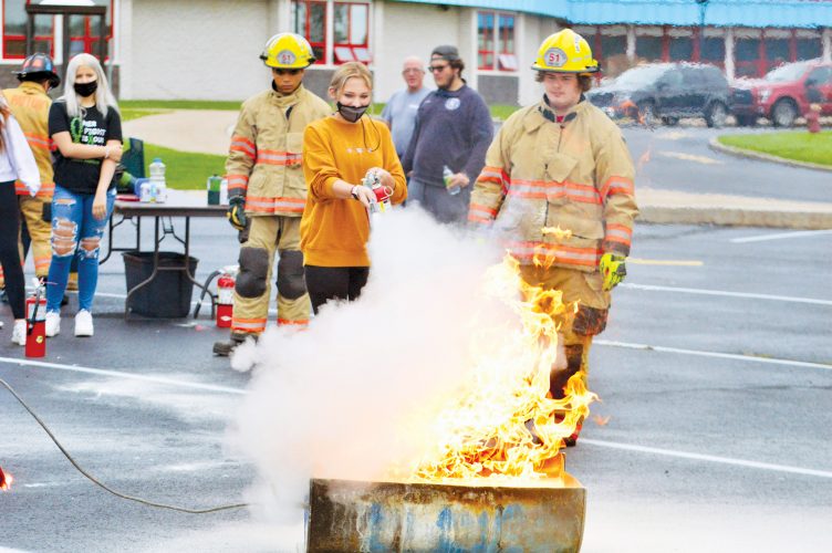Students get lesson on fire extinguishers News, Sports, Jobs